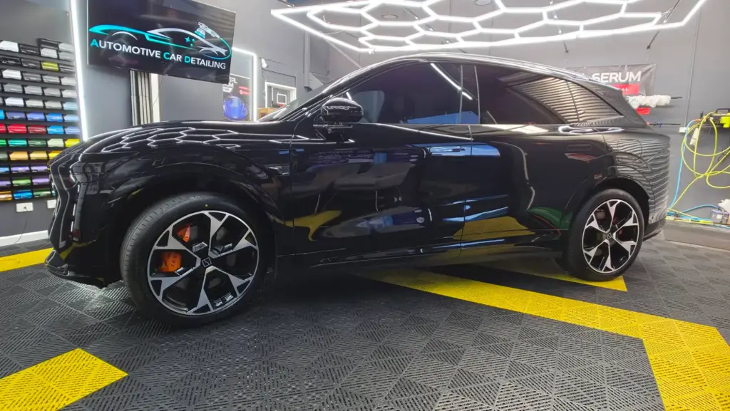 Black performance SUV with paint protection film at our Keysborough workshop